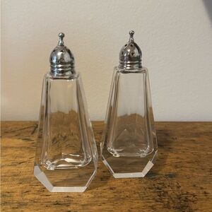 Elegant Glass Salt and Pepper Shakers with Silver Tops